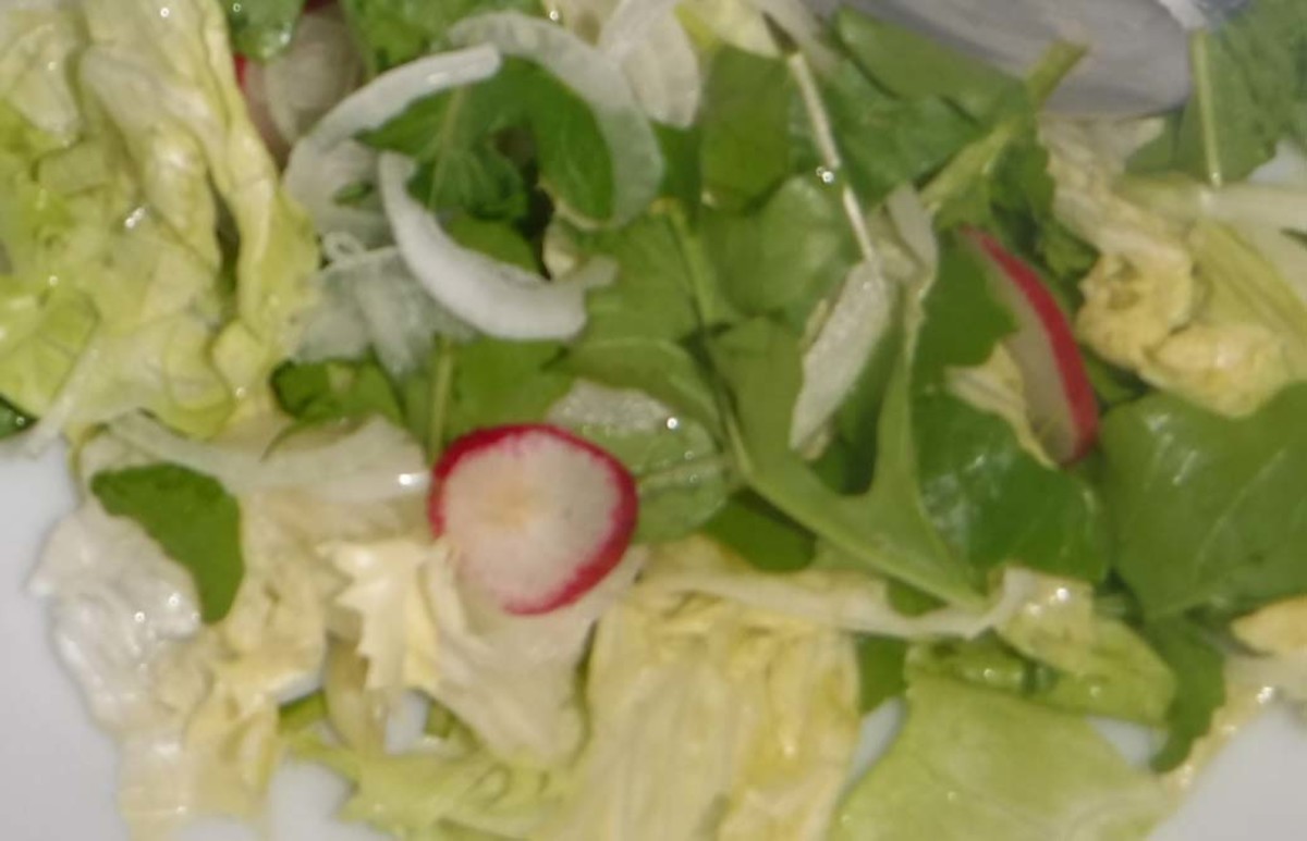 My favorite salad: Arugula salad with iceberg lettuce, onions, radishes, and of course, arugula.