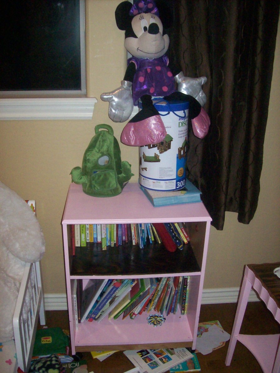 A $5 Goodwill cart with re-purposed wood inlay shelves and  shooting stars on both sides