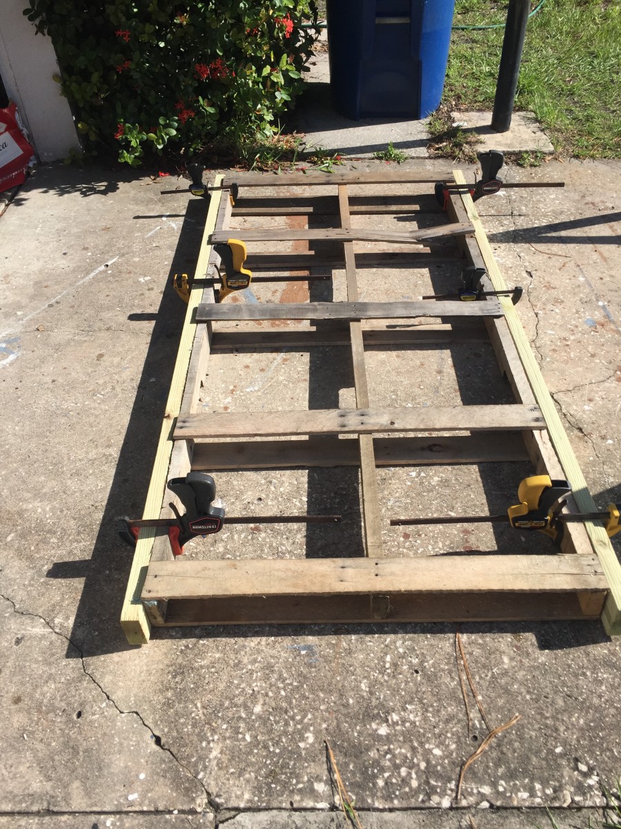 The pallet ready for rebuild with the 2x4 PT ready for gluing and screws 