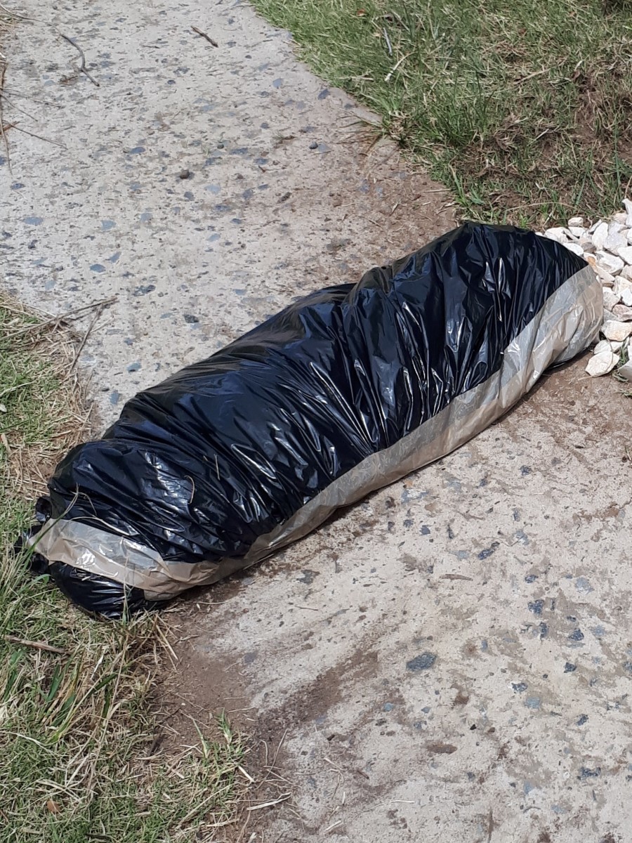 Bin bag filled with sand. 