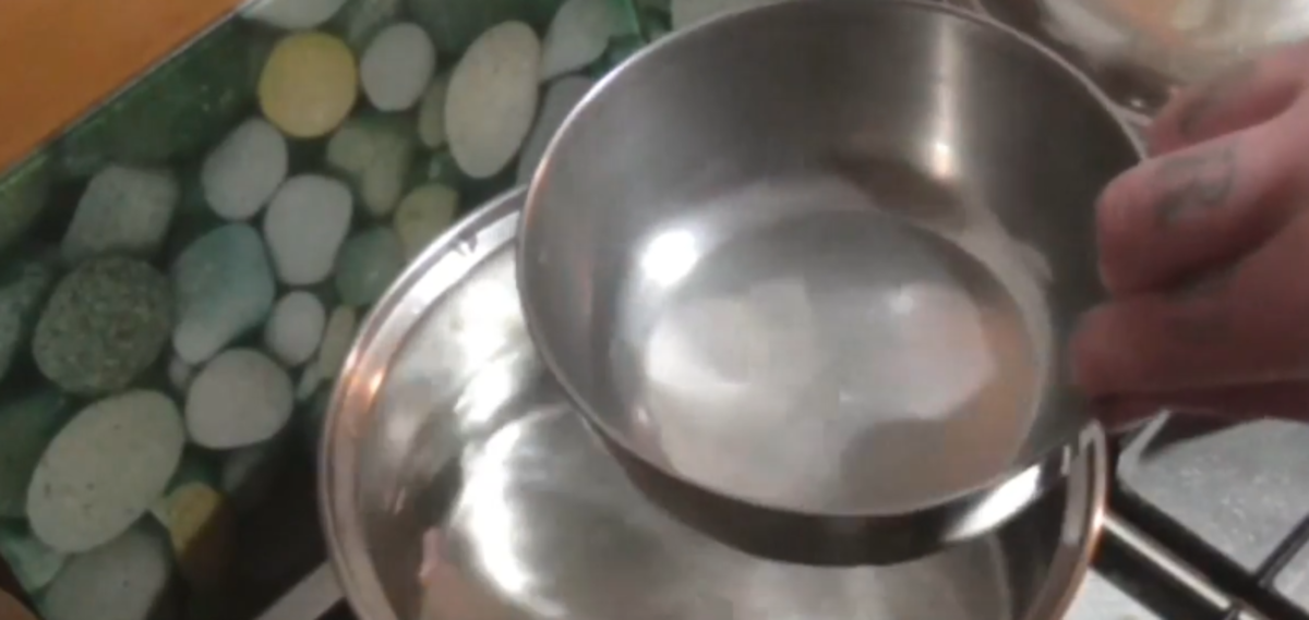 You can make distilled water with nothing more than a pot and some ice.