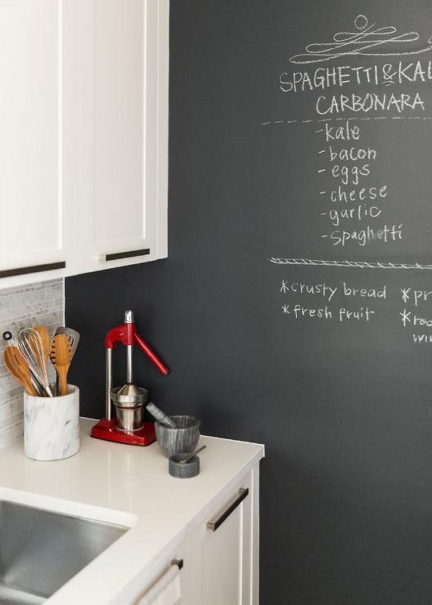 A kitchen chalkboard wall is the ideal spot to jot down your grocery list for tonight's dinner.