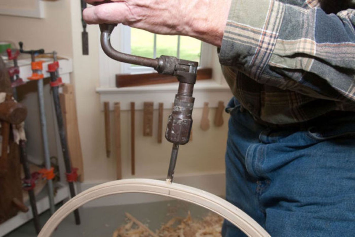 Drilling 3/8" holes in the bow to accept the spindles.