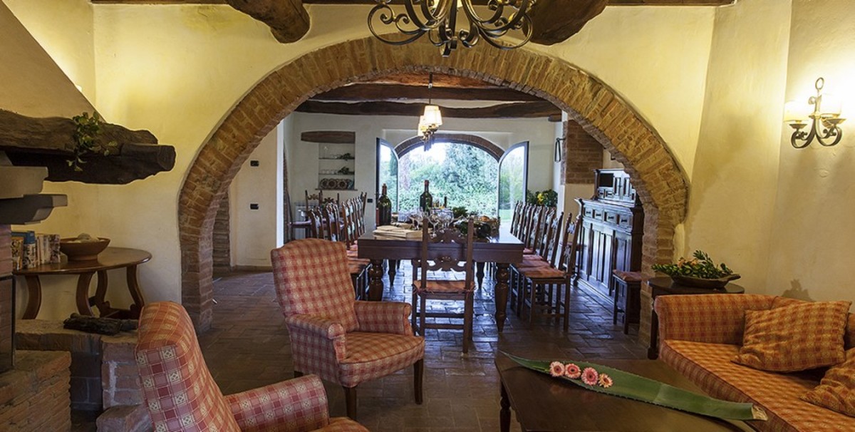 Earthy tones, rough textures and sunny  Mediterranean colors give it the authentic Tuscan country look. 