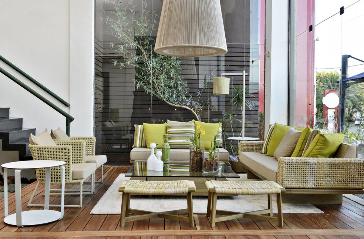 Fresh and verdant fabrics along with plants and furniture that works indoors or out.