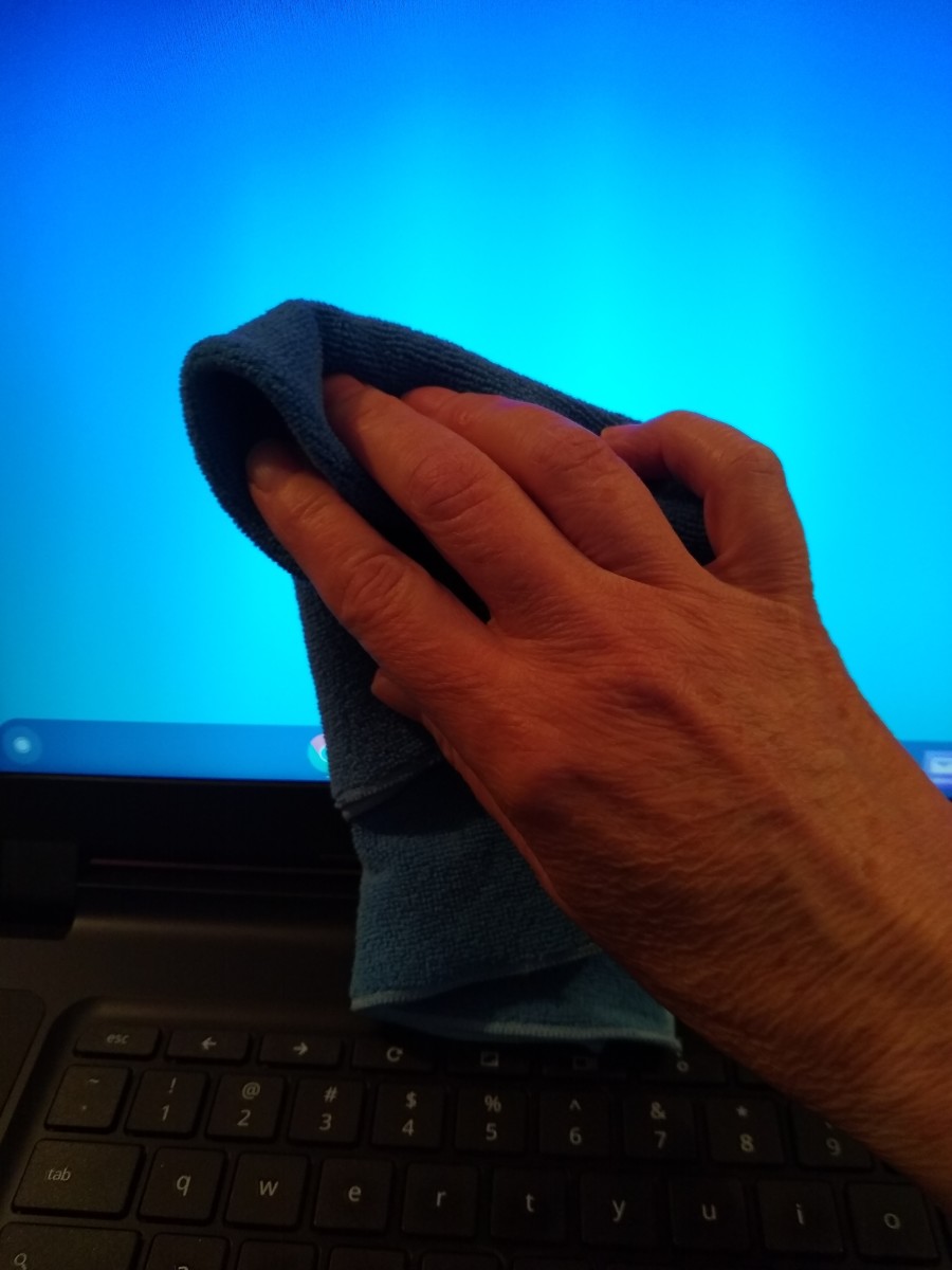 Use microfiber fabric to clean screens with an alcohol-based eyeglass lens cleaner.