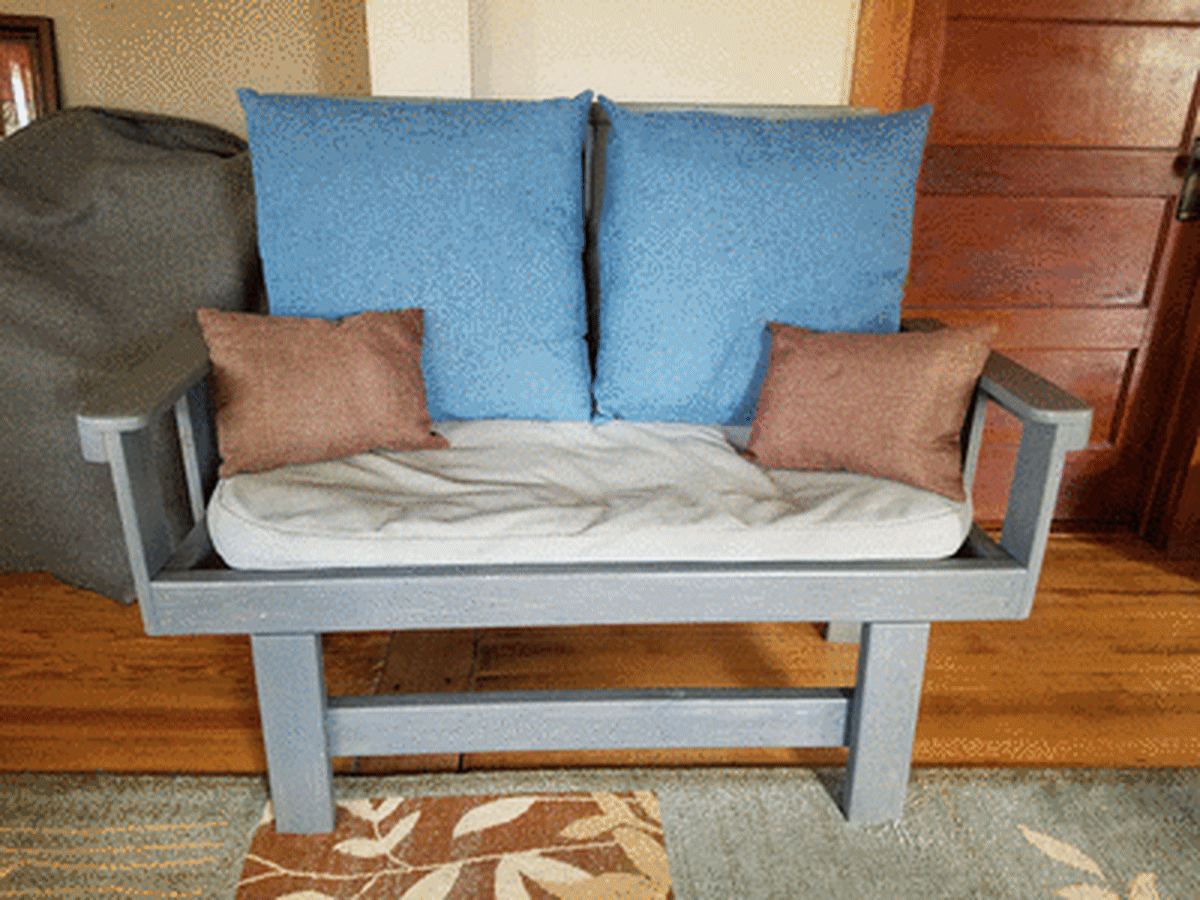 Our loveseat can be folded out of the way for added floor space, or turned into a daybed.