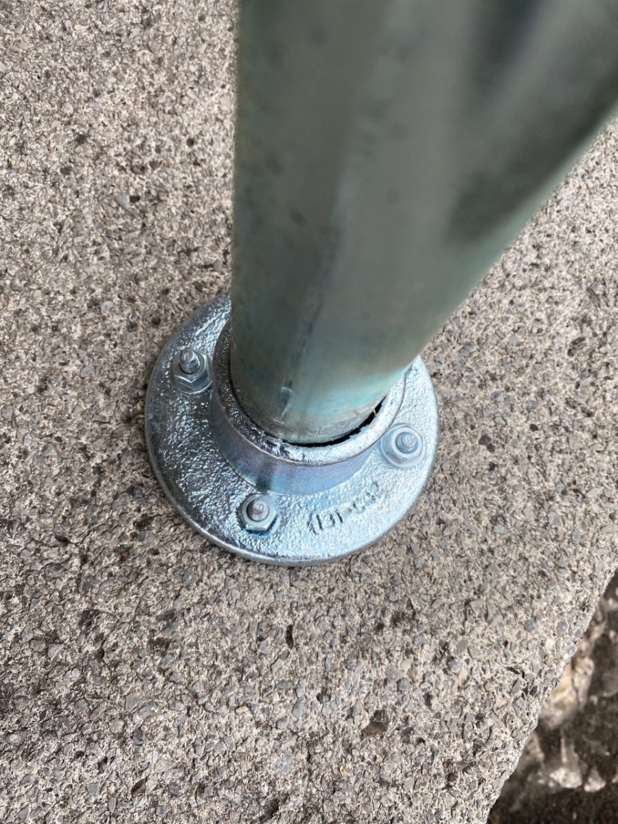 Floor flange with anchor bolts installed