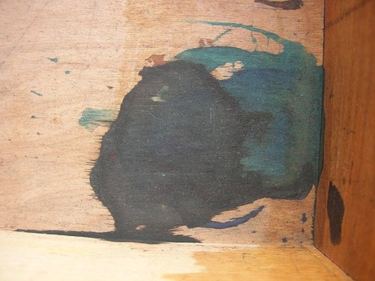 Removing ink from wood can be very difficult.