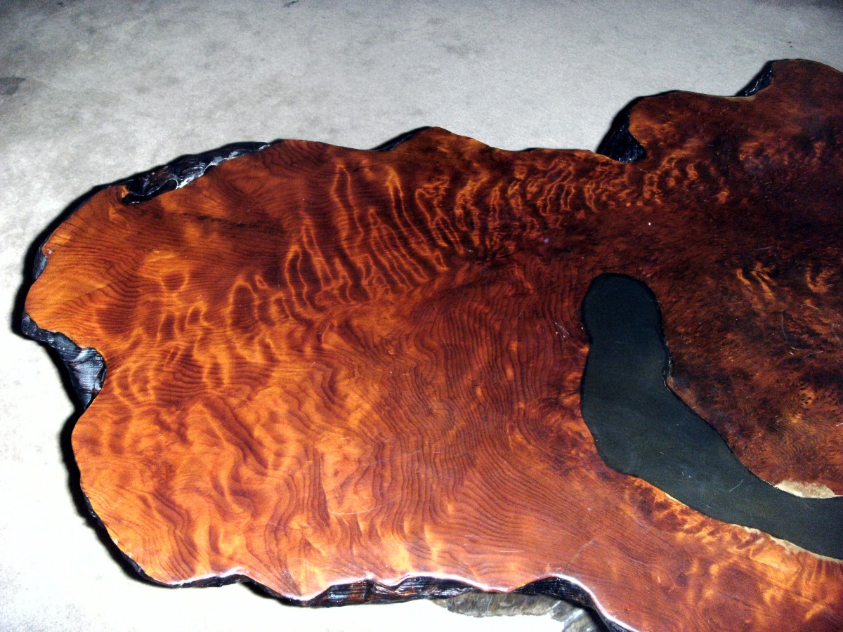 The "hole" in the burl wood.