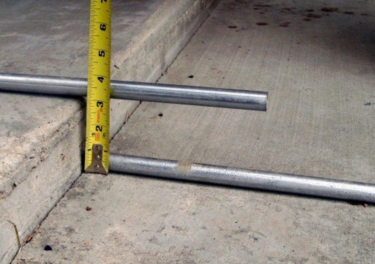 Measuring straight between the original, bottom, and temporary, top conduit the distance is exactly 3 1/8"