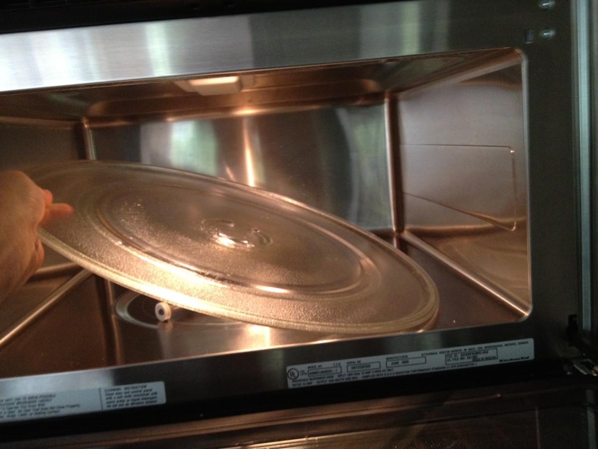 Take the plate or tray out of the microwave to wash and dry.  Wipe out oven with an all-purpose cleaner.