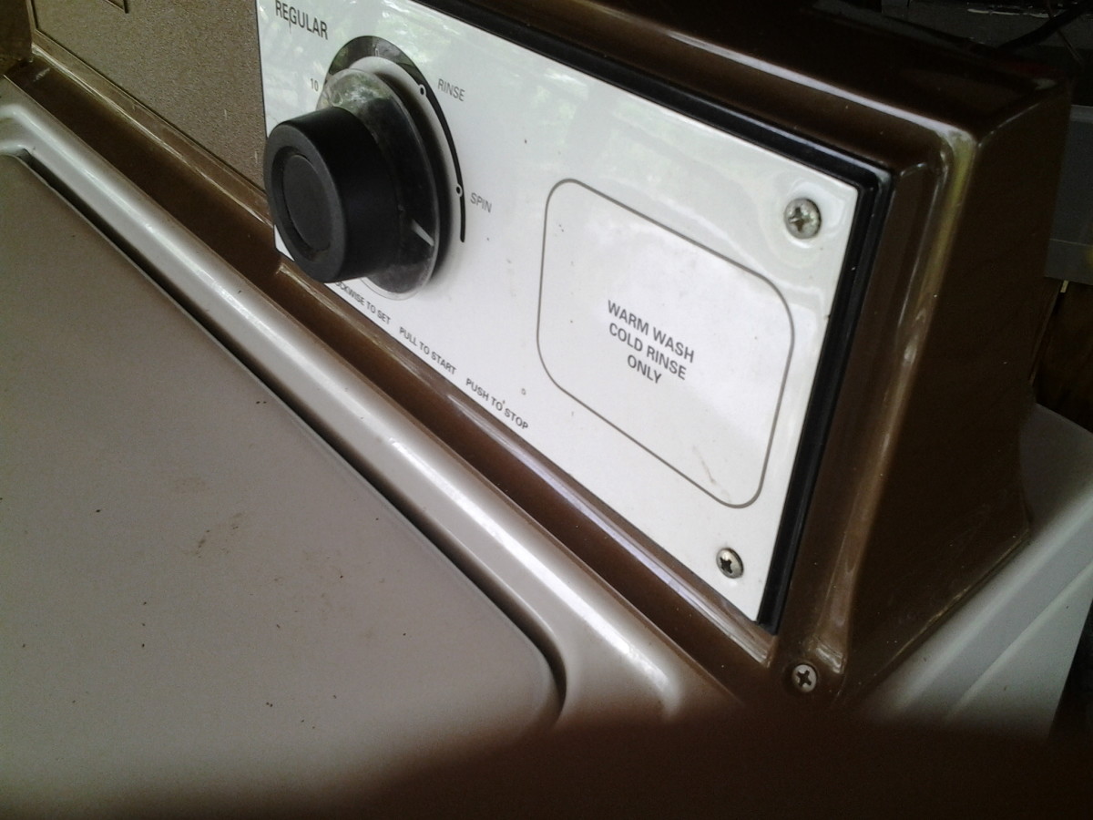 Here's what the lid switch looks like in most washing machines.