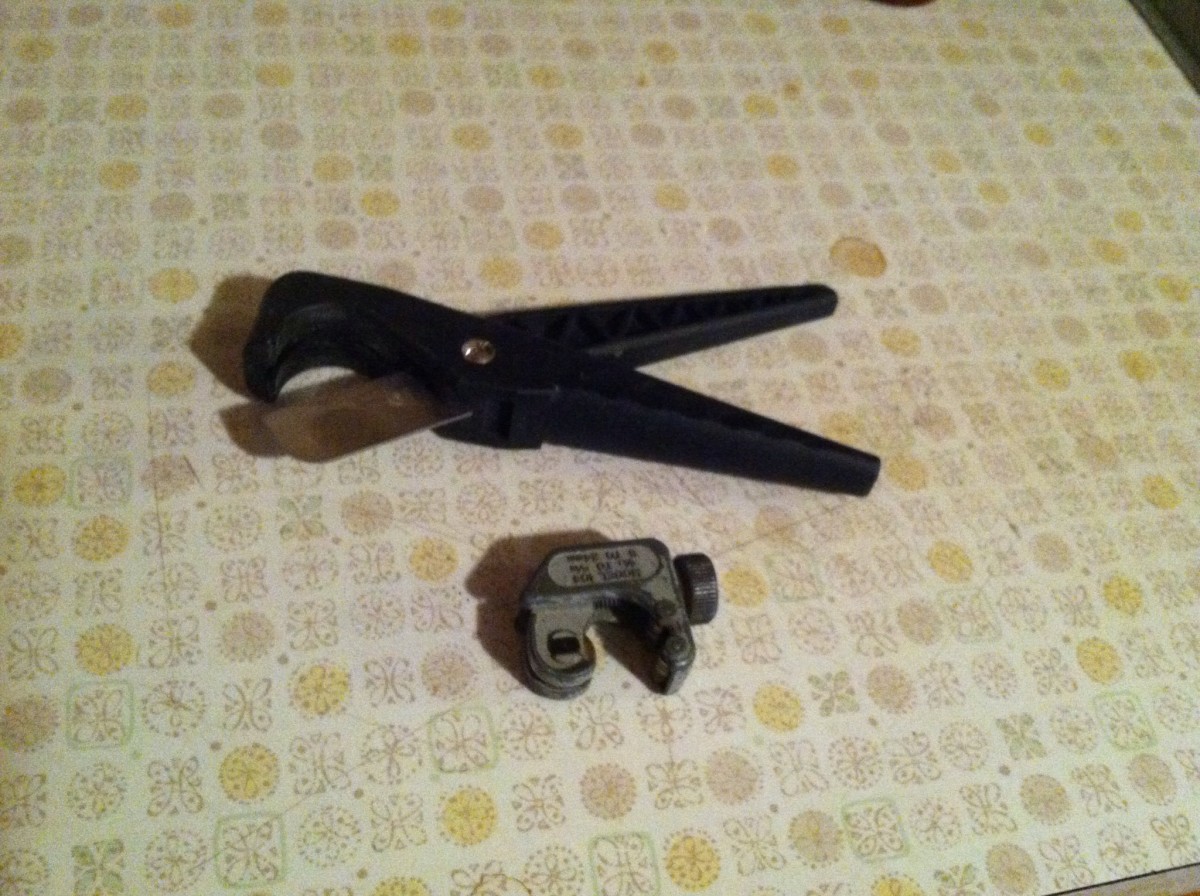 Plastic Tubing Cutter (top) & Small Tubing Cutter (bottom- recommended, though larger sizes are available for larger piping).
