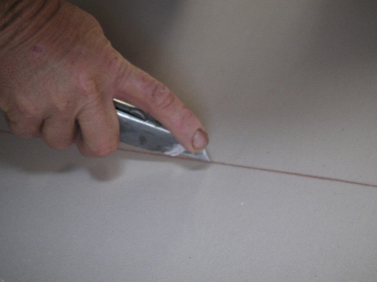 Score the outline with a utility knife.