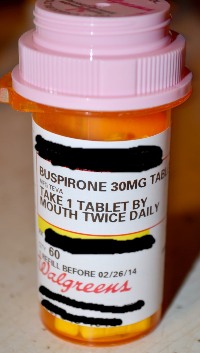 A labeled prescription bottle. Personal information removed for privacy reasons.