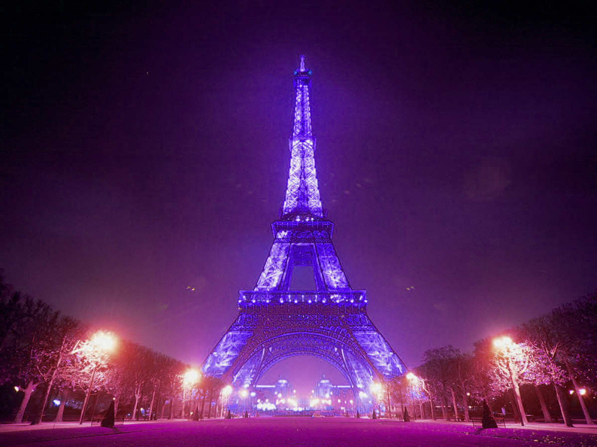 A desktop wallpaper photo showing the Eiffel Tower at night. Wallpaper websites show photos of lighted monuments as their background and some make money off them as well.  Are they now copyright infringers?  