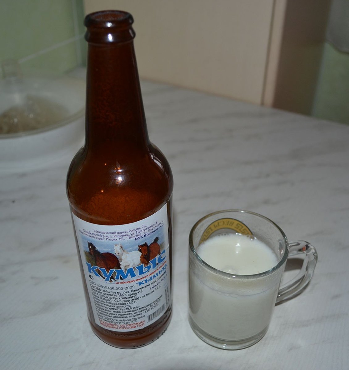 Here is a fresh bottle of kumis—fermented horse's milk—I just drank this before lunch!