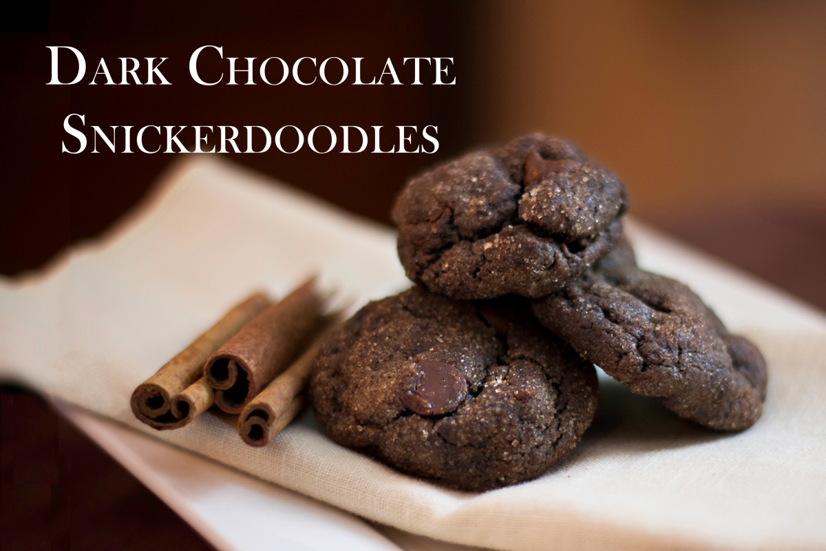 A delicious stack of dark chocolate snickerdoodle cookies, rolled in cinnamon!