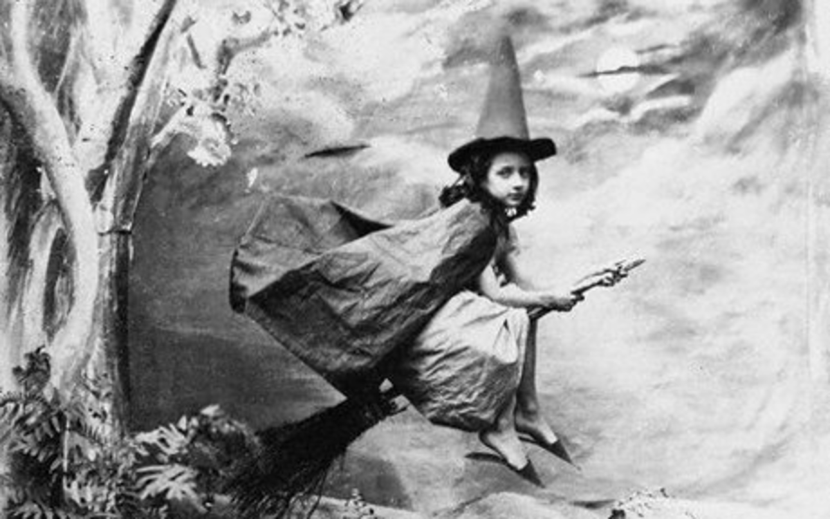 Vintage photo of a witch, public domain image.