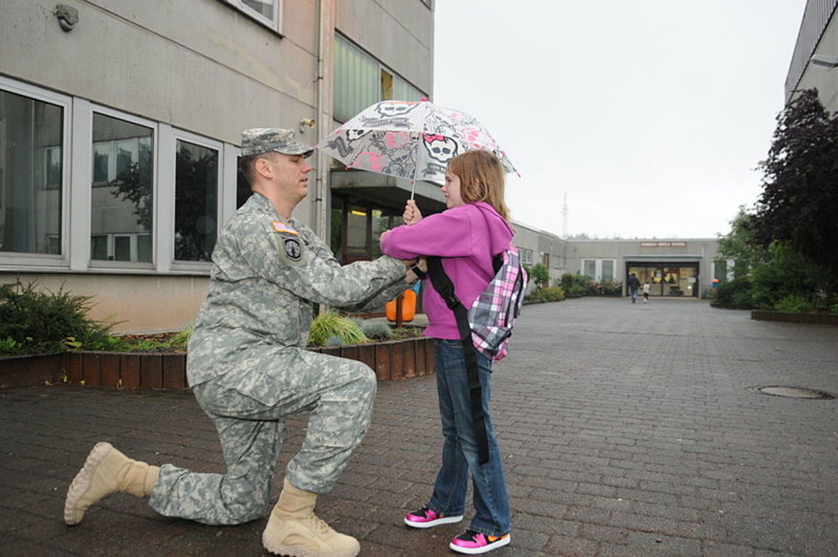 A parent's parting word or gesture can influence the child's behavior throughout the day. Photo by Spc. Iesha Howard