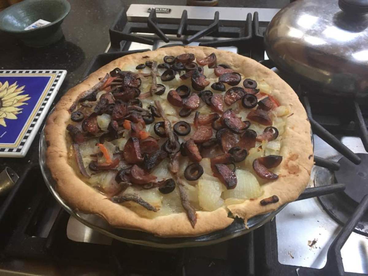 A completed pizza pie. 