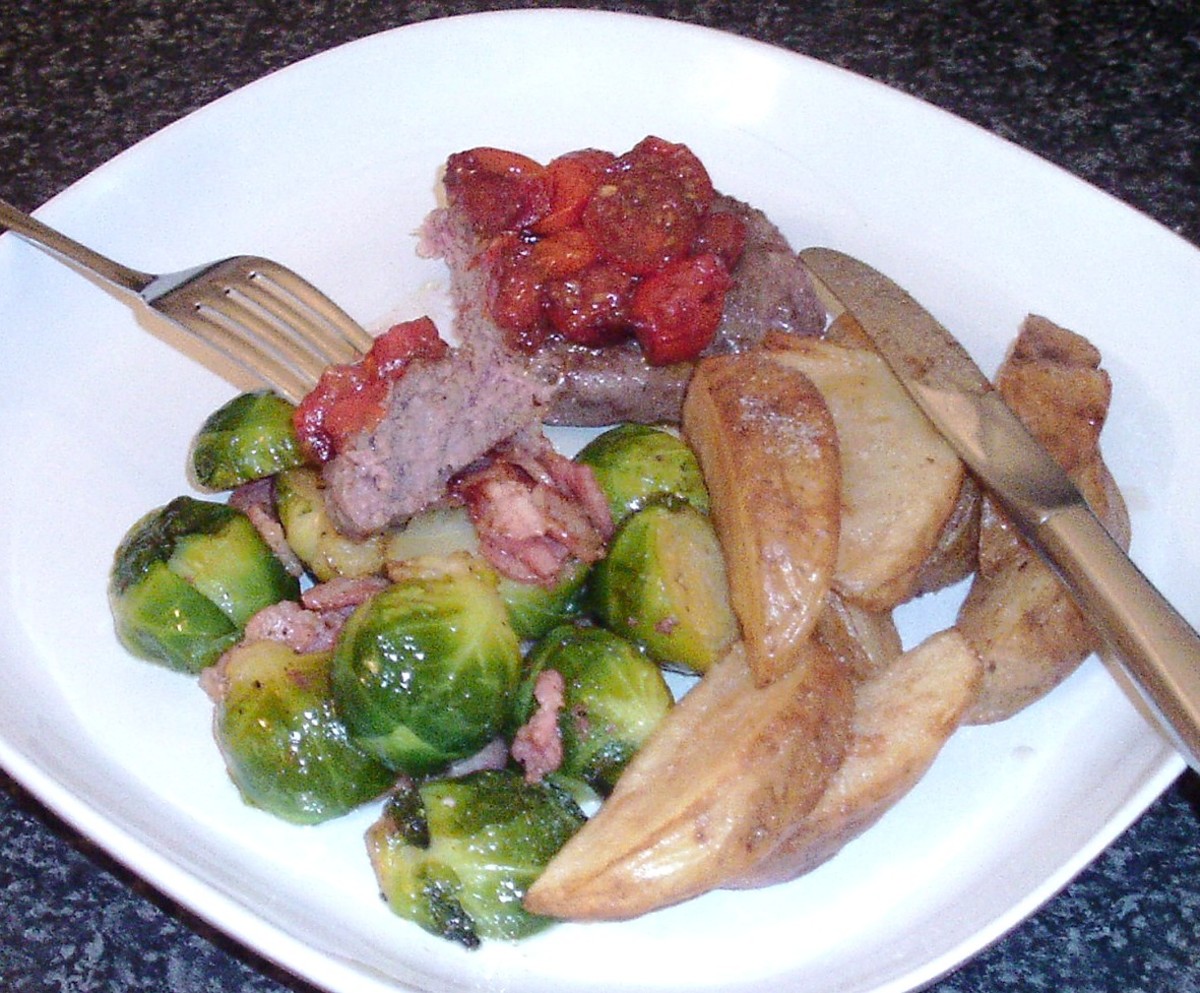 Brussels sprouts sauteed with bacon and served with a burger, homemade tomato chutney and potato wedges