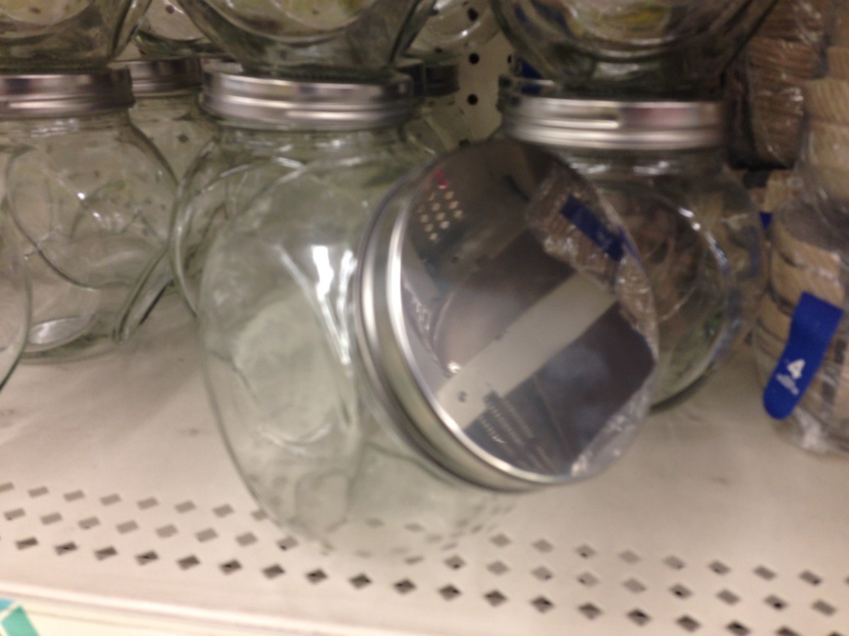 The metal lid of this tilted candy jar is a useful size.