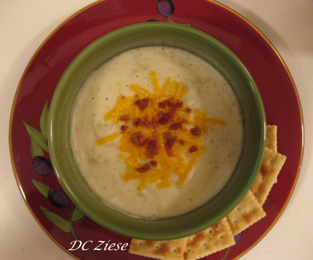 Potato Soup with shredded Cheddar cheese and crumbled, cooked bacon