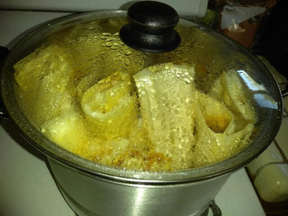 Tamales are cooked in a large vegetable steamer, like this one.