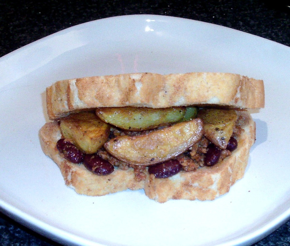 Lamb chilli and spicy oven chips butty