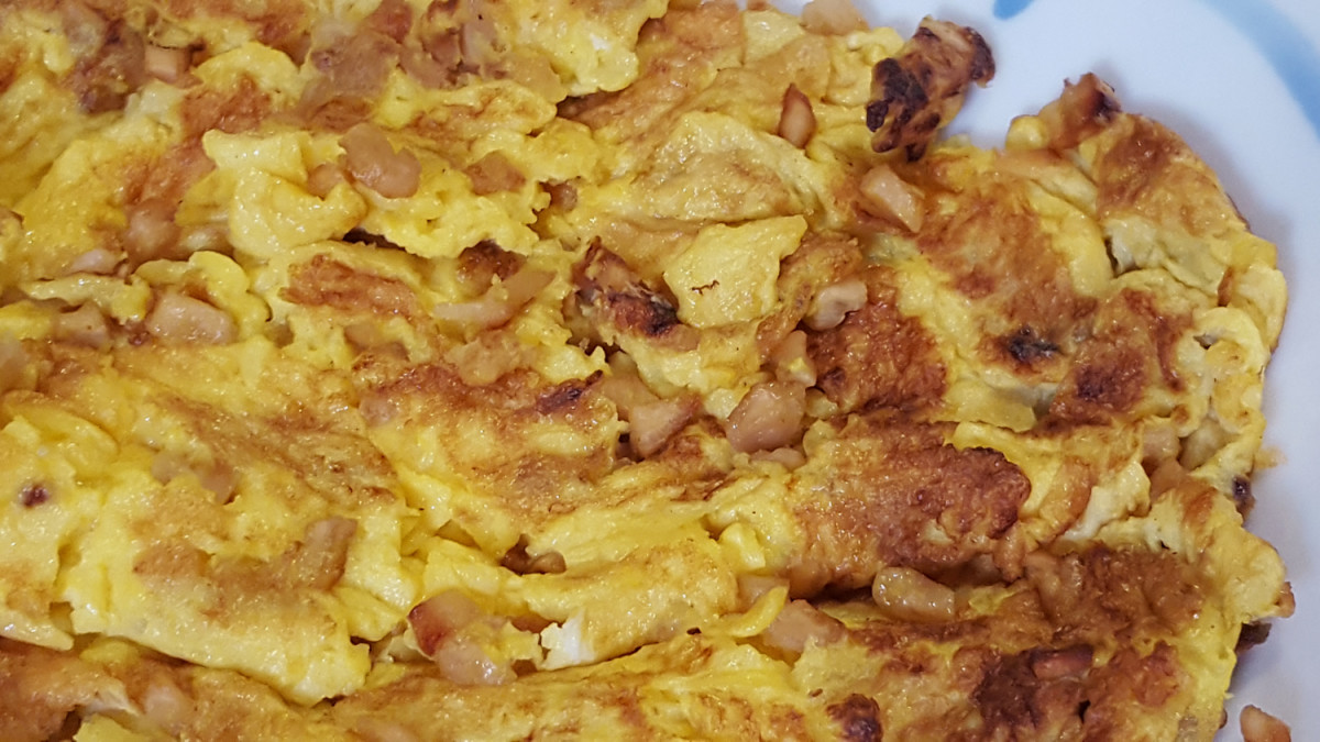 Choi Poh Omelette: a much loved home-style omelette with sweet salty preserved radish.