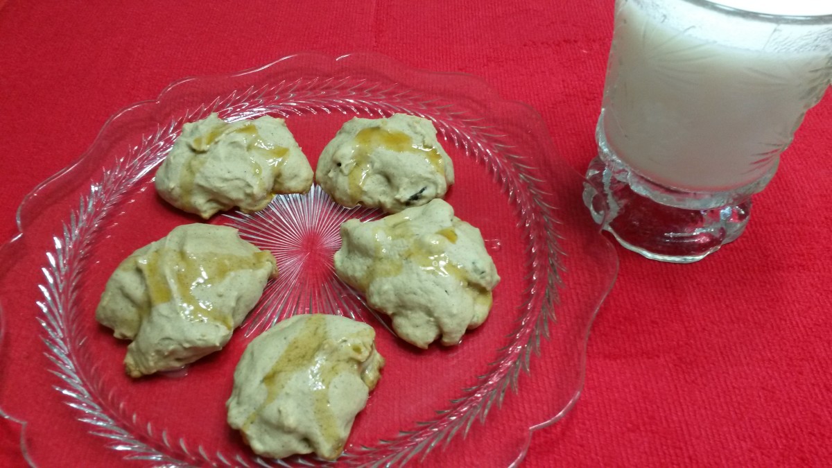 Applesauce Raisin Cookies with a glass of milk.
