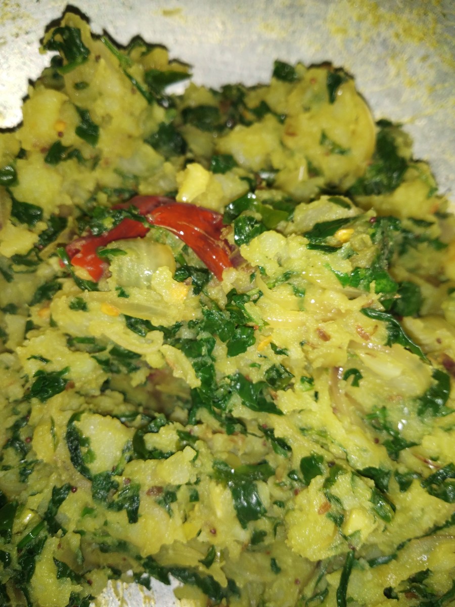 The completed aloo methi (potatoes with fenugreek leaves).