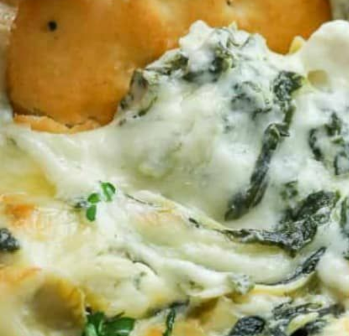 Ultimate Cheesy Baked Spinach Artichoke Dip