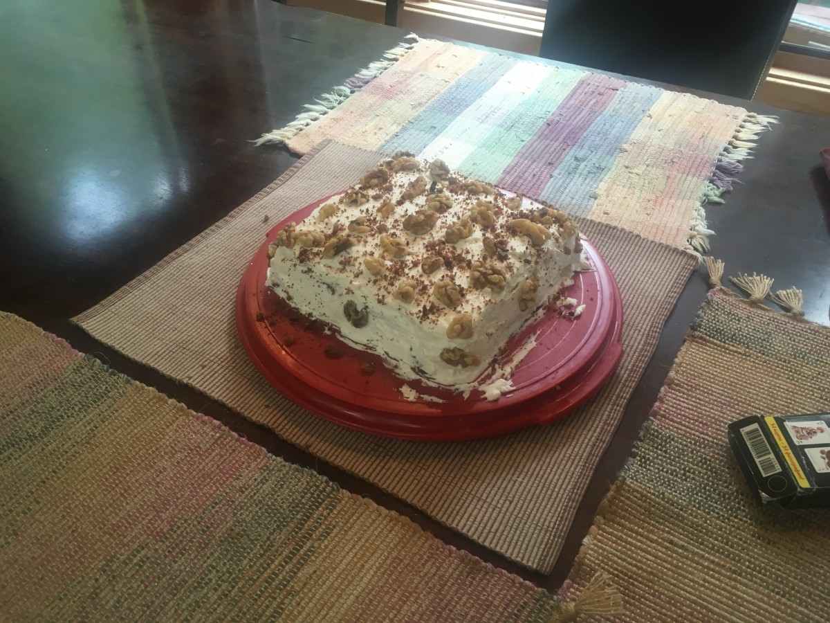 Chocolate walnut cake with whipped cream topping