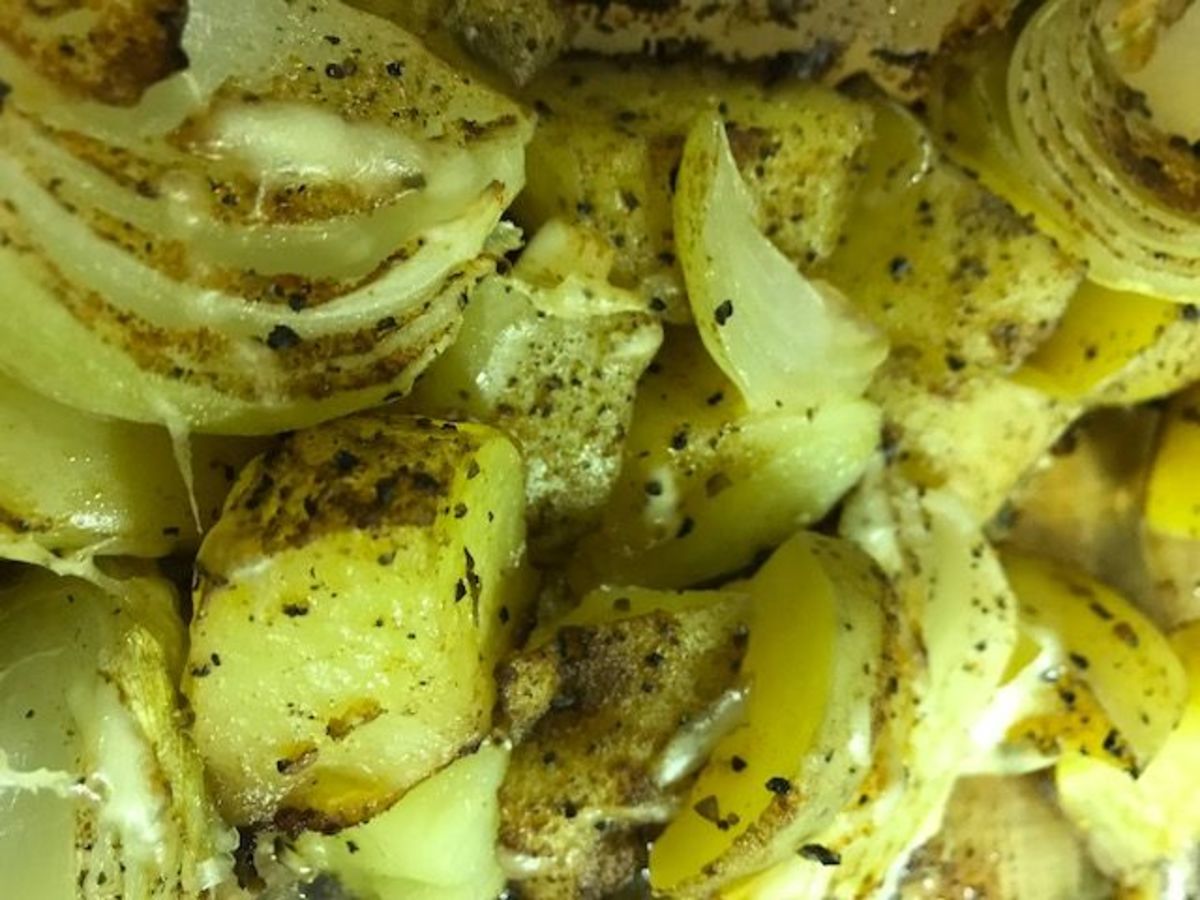 Potatoes baked with onions, garlic, spices, and Parmesan cheese