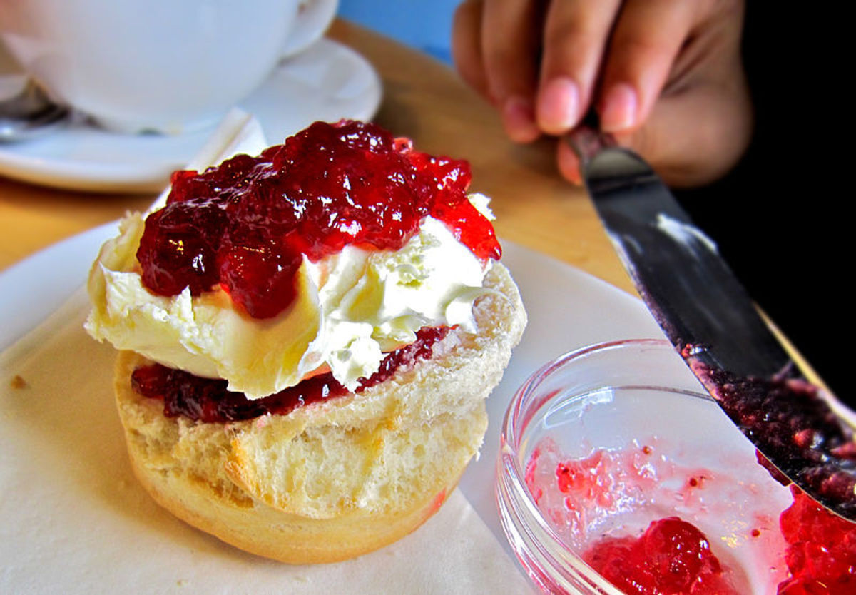 Classic baked scone with clotted cream and strawberry jam. Heaven on a plate!