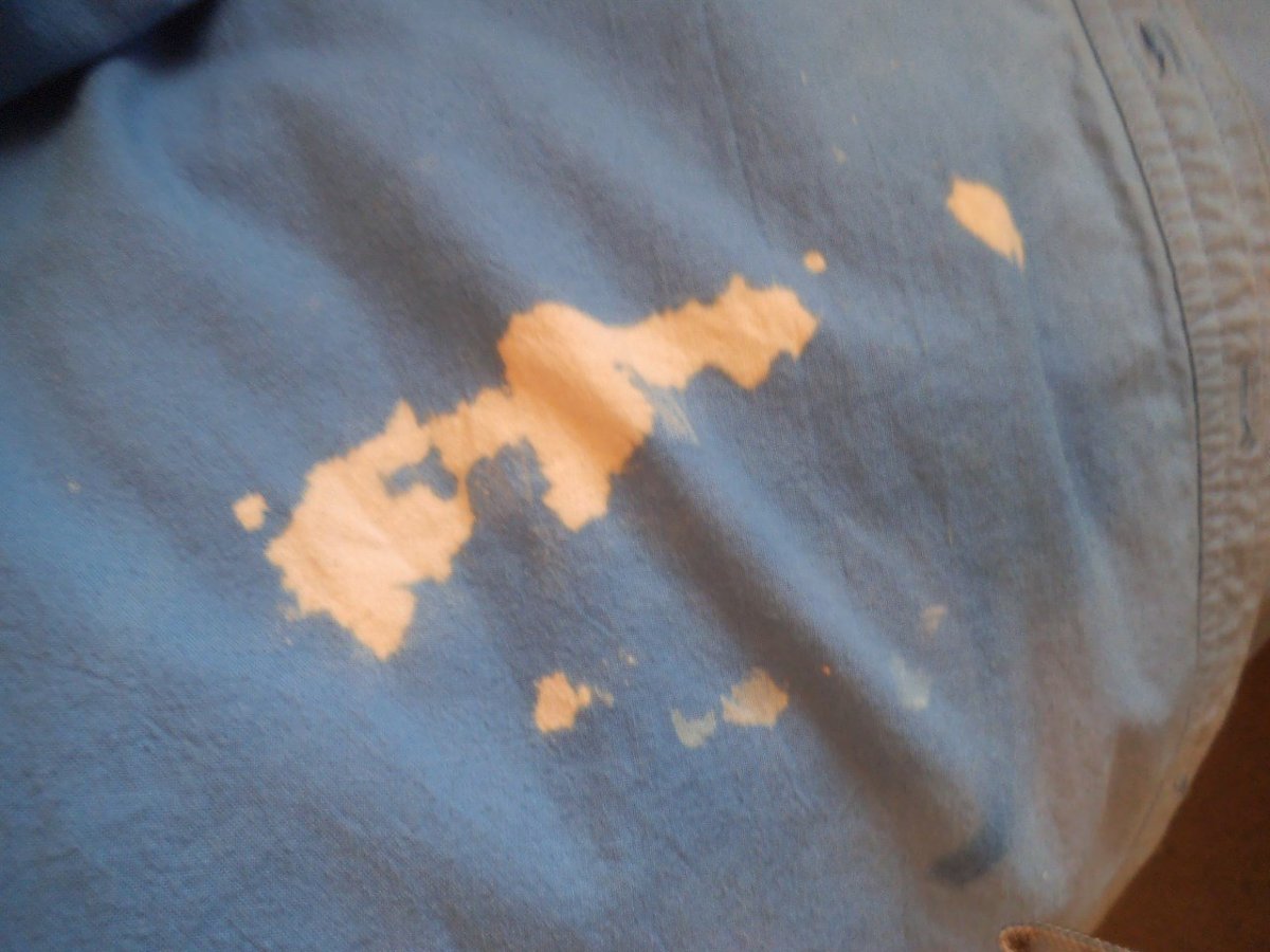Ack, this shirt is ruined by a bleach spot.     
