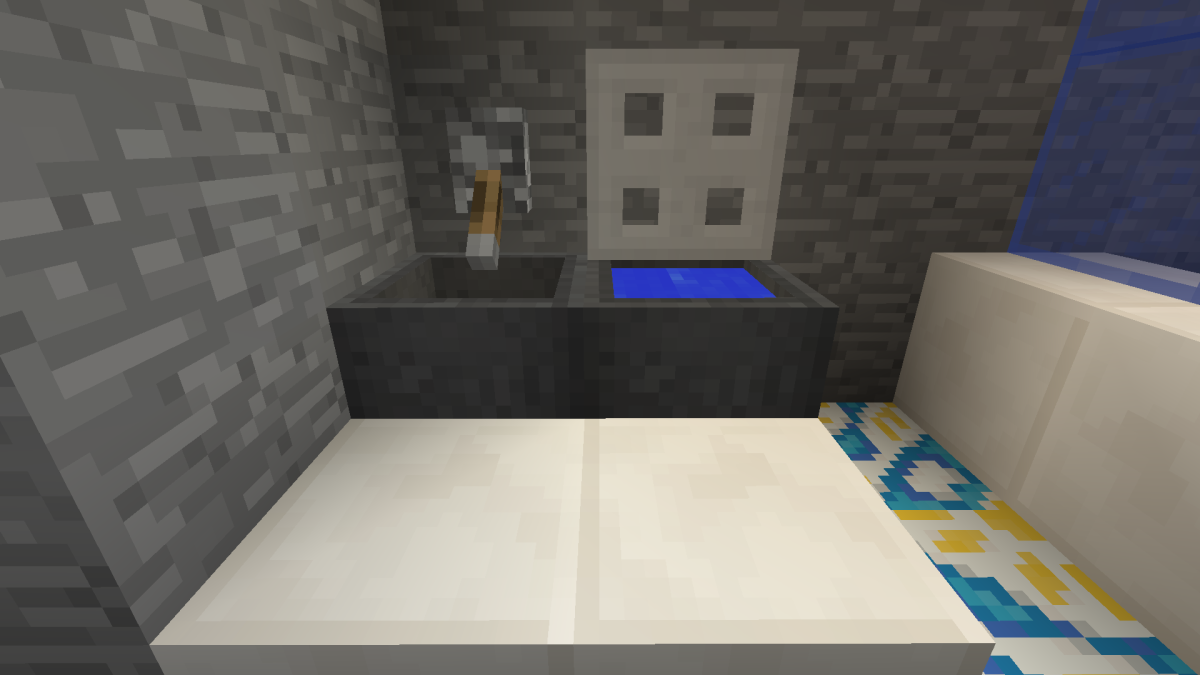 Placing stone slabs in front of the sink and toilet makes the bathroom look more fancy.