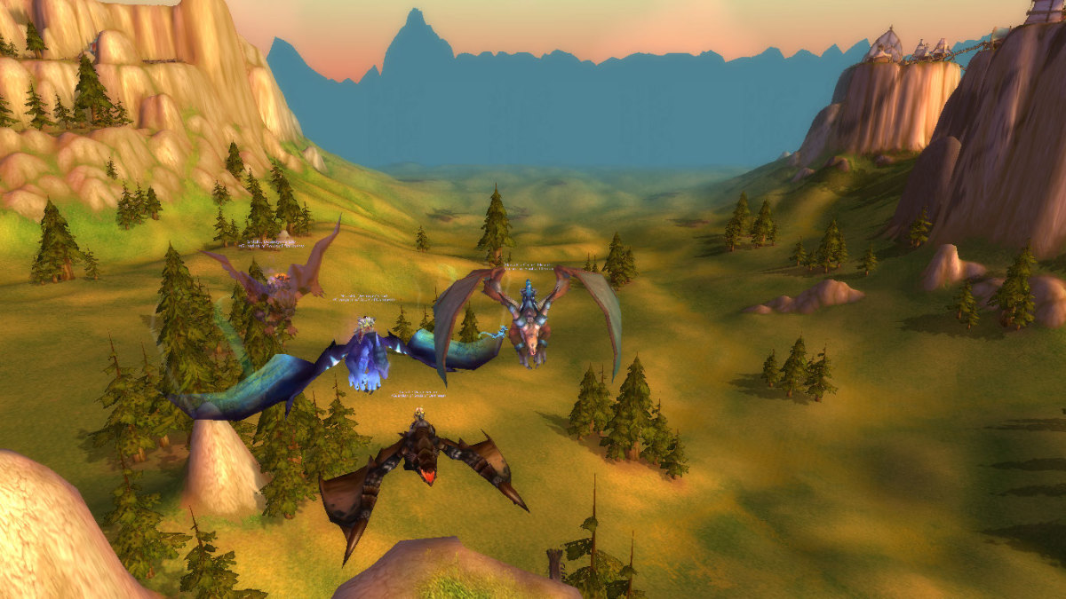 In this screenshot, Shadie (top left) is seen on his wind rider. Under him is Nozzikk, on his netherwing mount, and to the right is me on my Blazing Drake. At the bottom is my boyfriend on his Black Proto Drake.