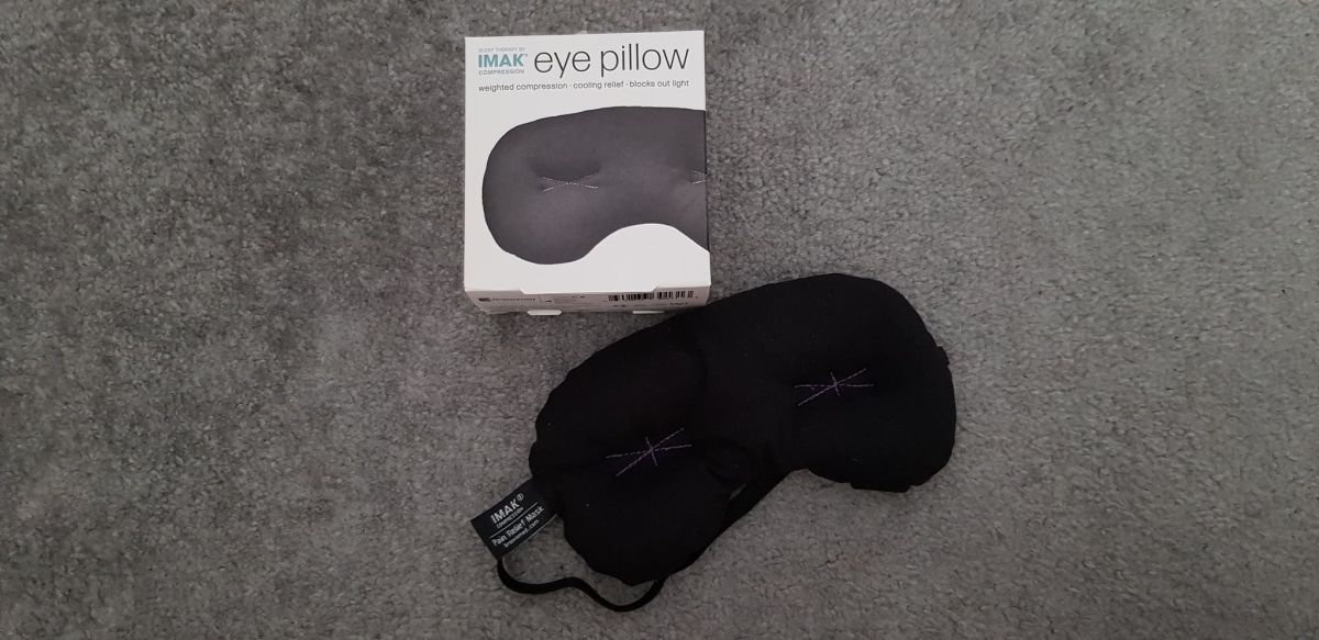 The IMAK Compression Eye Pillow (weighted eye mask) as it arrived in its original packaging.