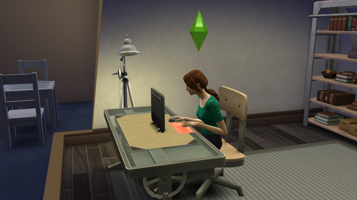 A sim honing her trolling skills—and, thus, her Mischief skill—on a computer in "The Sims 4."