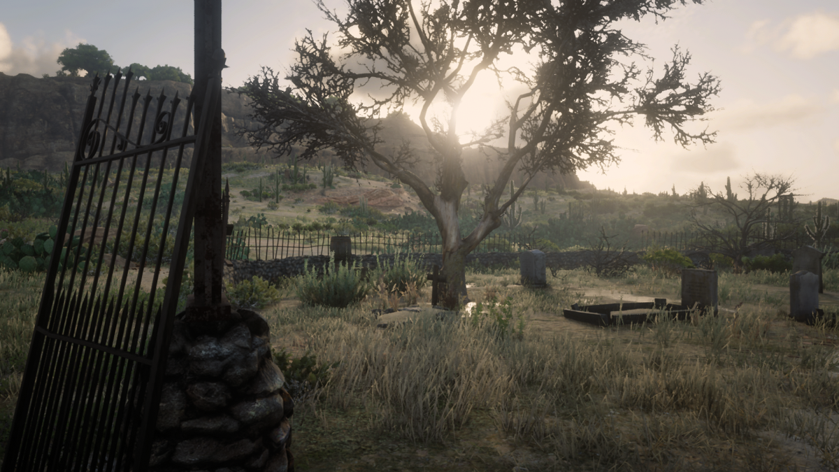 The treasure is in the grave directly under the tree. 