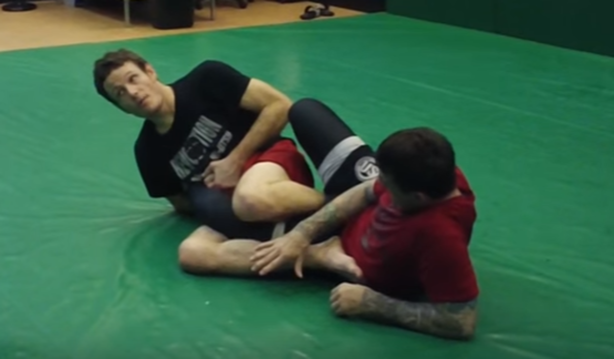 Applying the ankle lock.