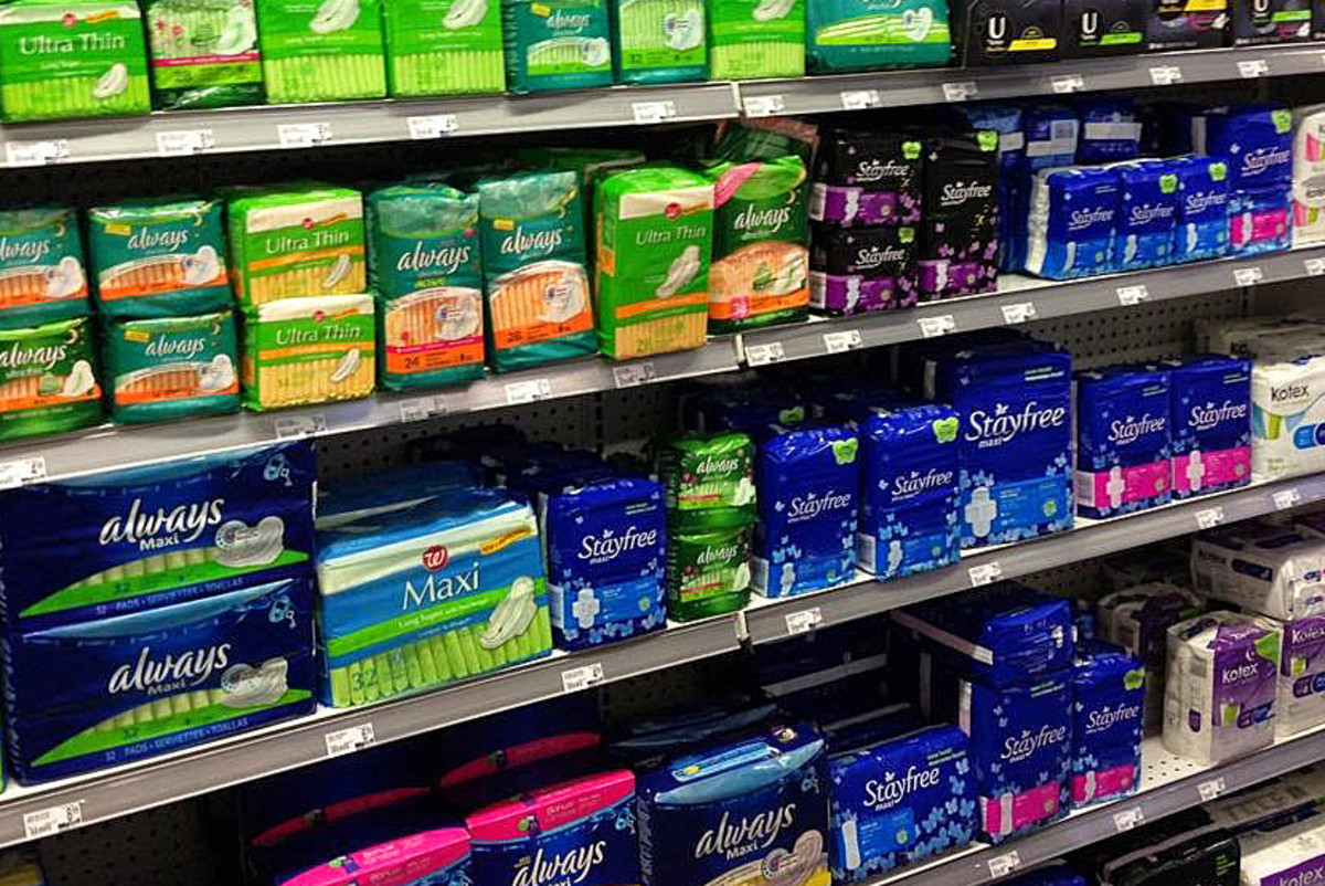 an aisle full of tampons and pads