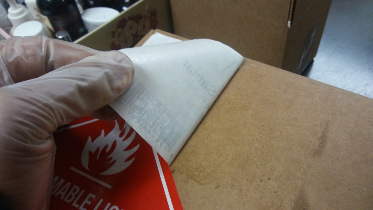 how-to-remove-sticker-from-cardboard-box