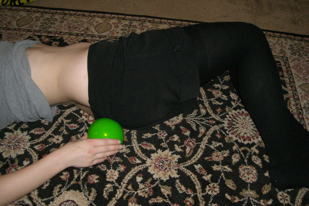 Gently roll to one side and quickly remove the ball so you don't engage your back muscles for too long.