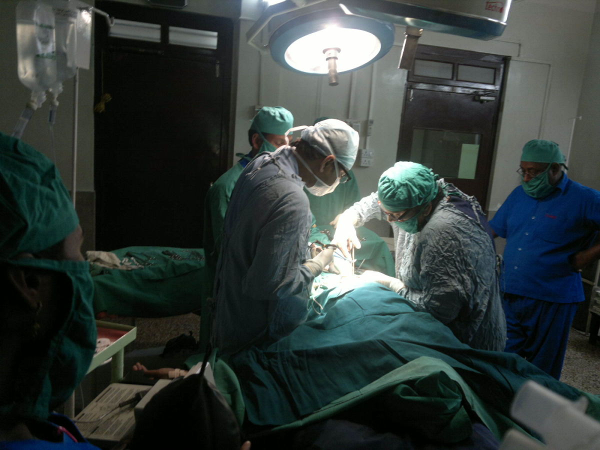 Dr. Stuti Khare & Dr. Biswajit Mahapatra working on the patient.