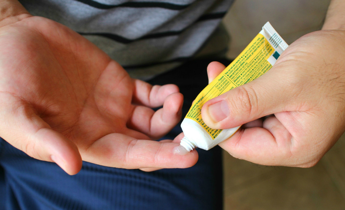 Apply an antibiotic ointment or Vaseline to blistered skin before wrapping the area in bandages.